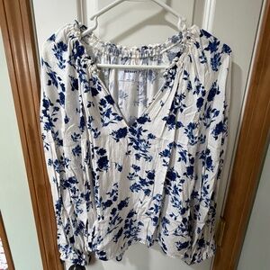 White and blue floral v-neck blouse